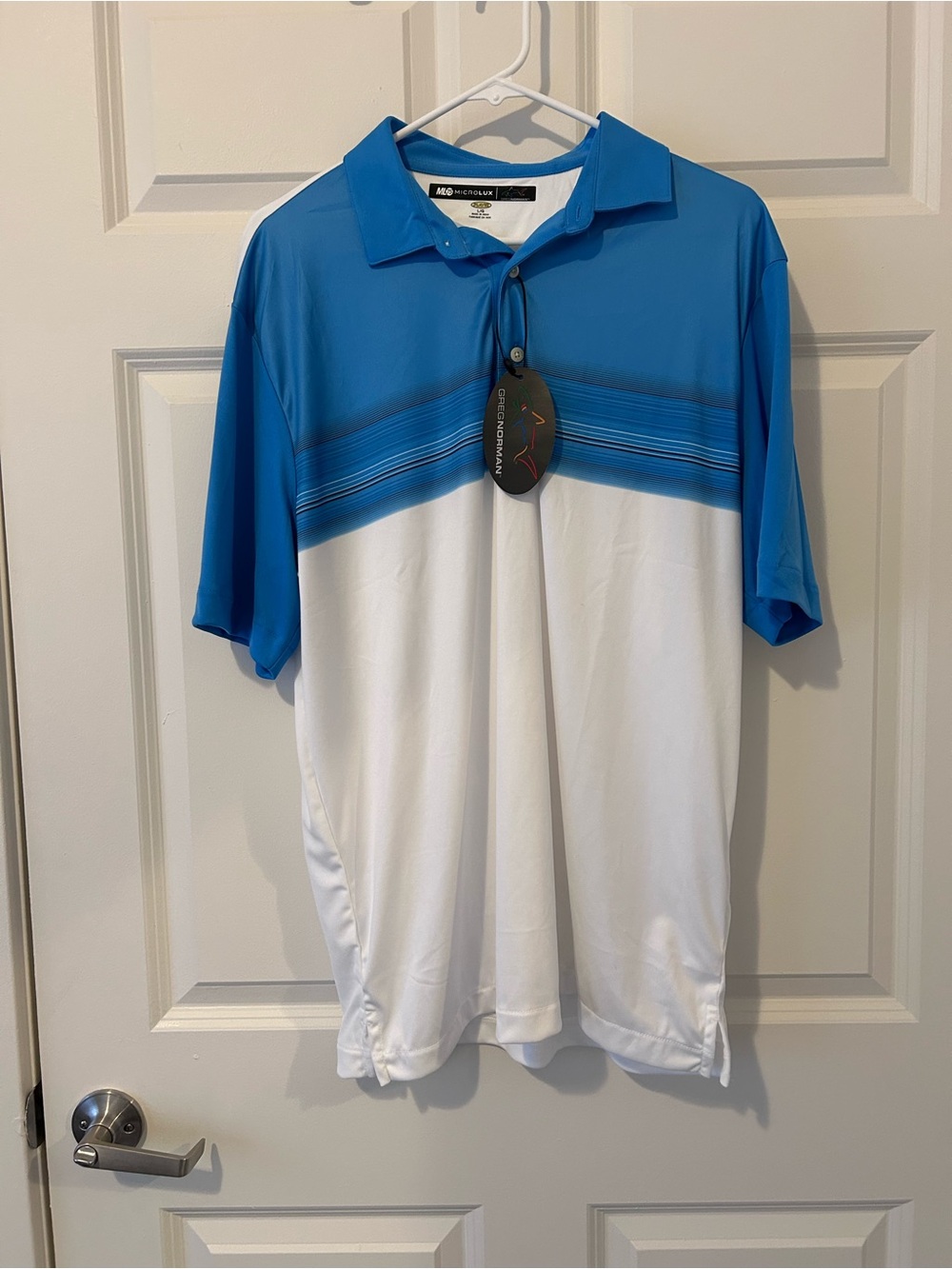 NWT Greg Norman Men’s Blue and White Polo Golf Shirt